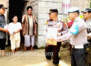 Polres Labuhanbatu Beri Bantuan Sosial Pada Warga Terdampak Banjir Di Kecamatan Marbau.